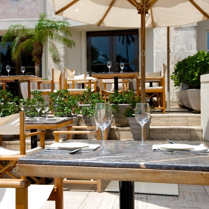"A shot of outdoor dining table setting in Ocean Drive, Art Deco districtPlease, check out my growing collection of Restaurant images. Click on the pictures below."