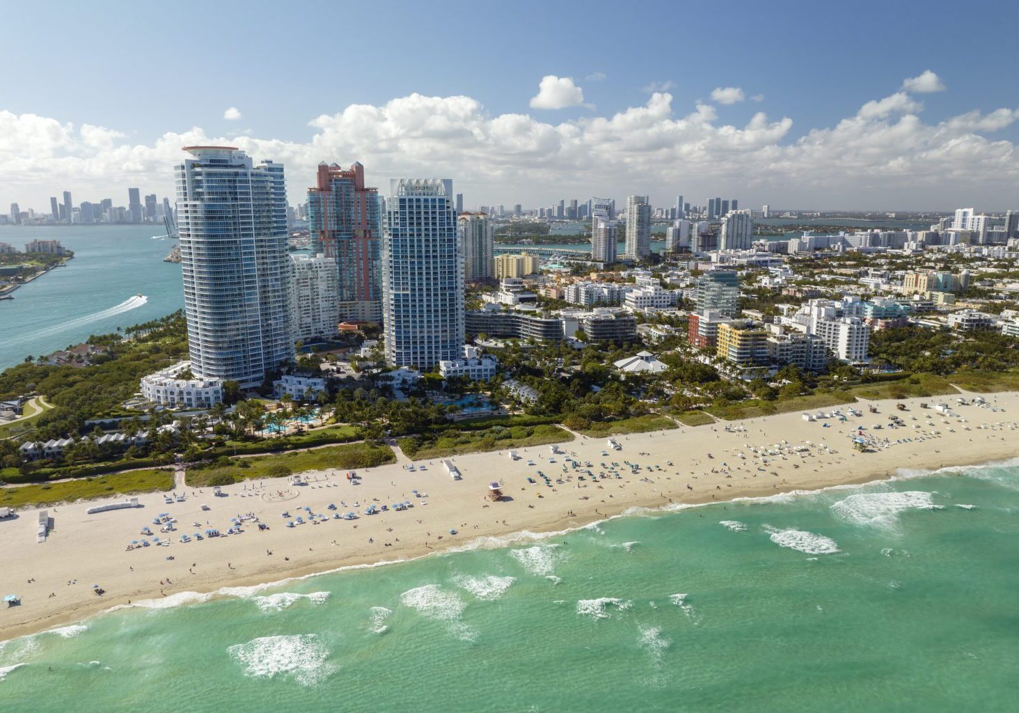 View from above of American southern seashore of Miami Beach city. South Beach high luxurious hotels and apartment buildings. Tourist infrastructure in southern Florida, USA.